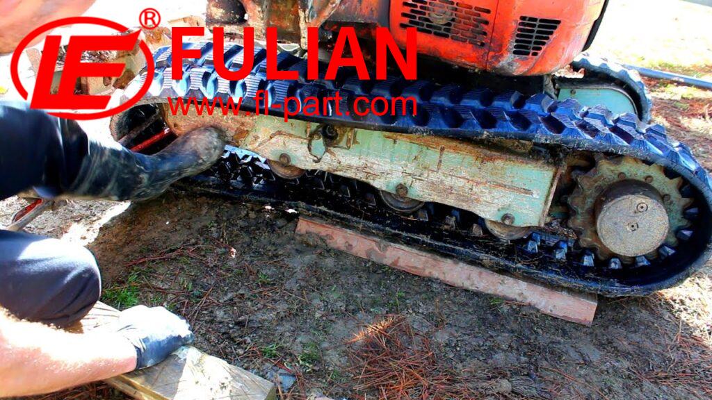 how do i install new tracks on a mini excavator